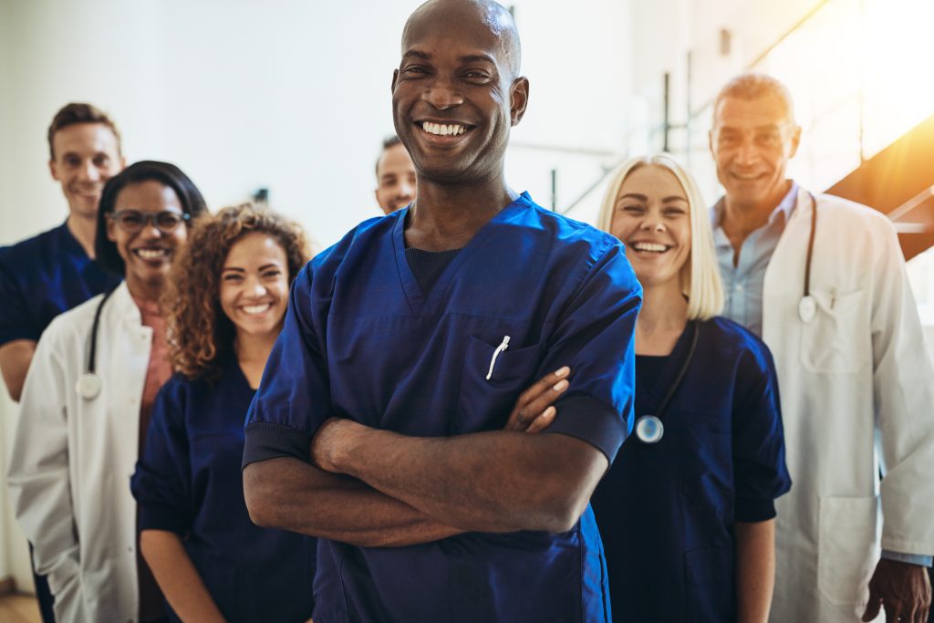 doctor smiling at their job